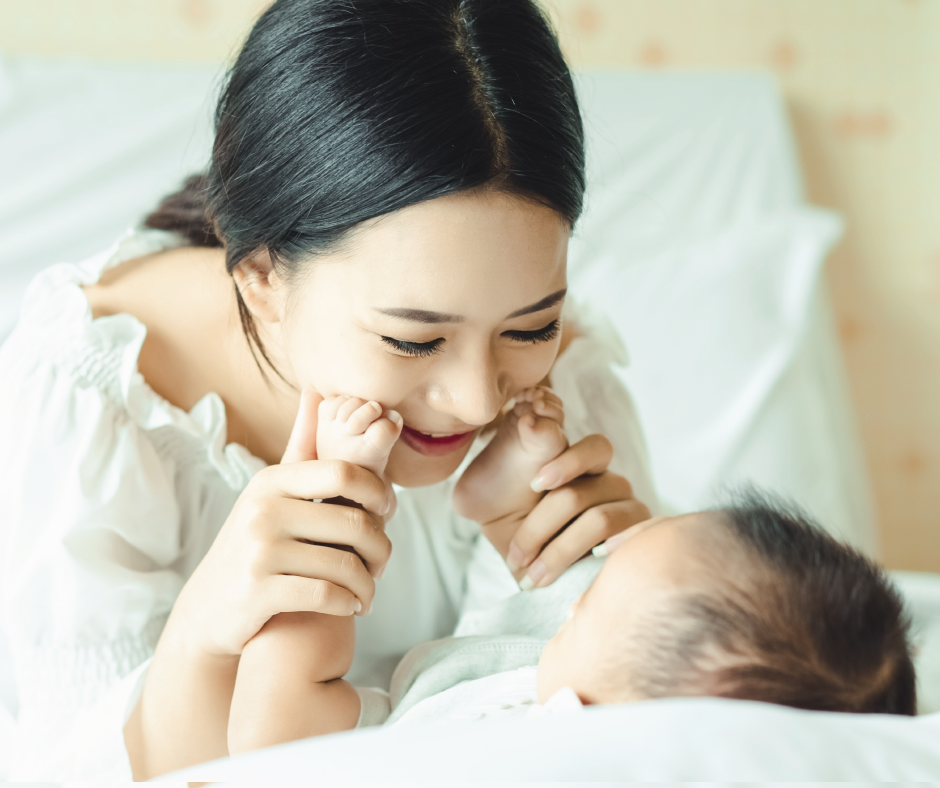 Woman Playing With Baby Woman Playing With Baby