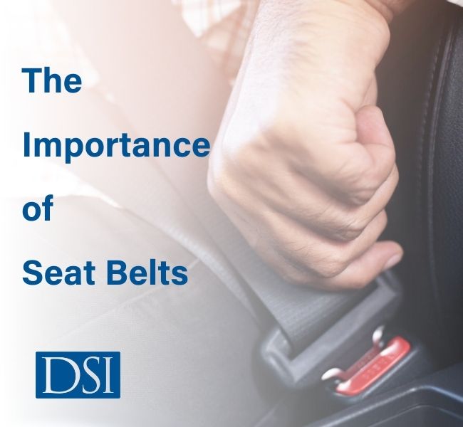 putting on seat belt in a car